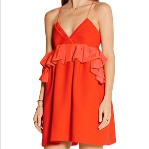 Victoria Beckham orange ruffle dress